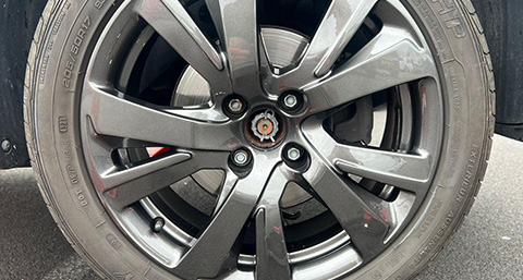 the wheel allows of a car polished and painted in a dark grey colour